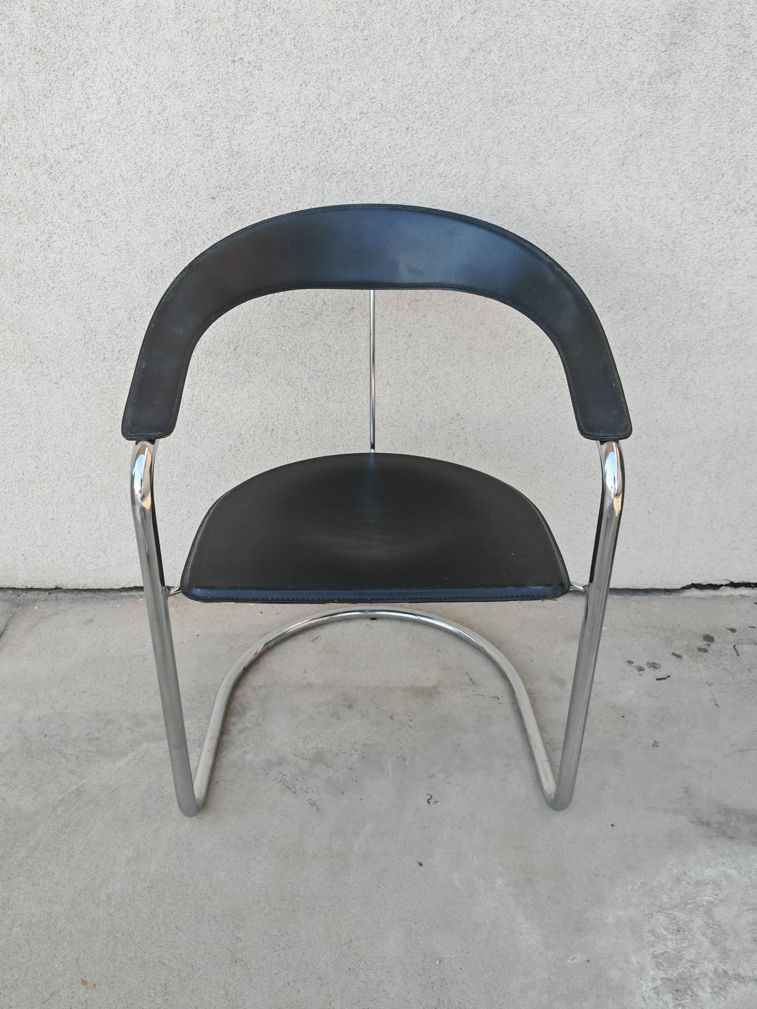 Set of 4 postmodern Canasta leather armchairs by Arrben from the 1970s.