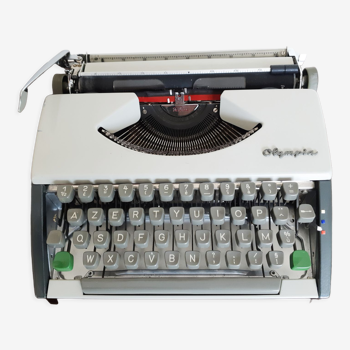 Machine à écrire portable vintage fonctionnelle Olympia