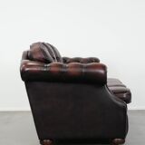 Red 2.5-seater Chesterfield sofa on wheels in English style