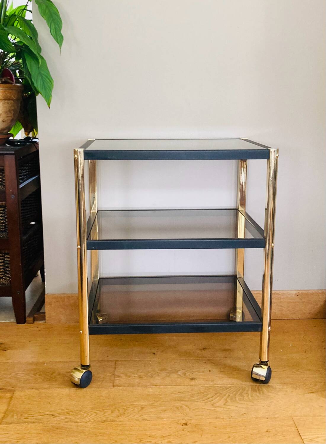 Side table in gold metal and smoked glasses 1970s