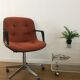 Vintage orange armchair model 451 with wheels by Steelcase Strafor, design by Randall Buck