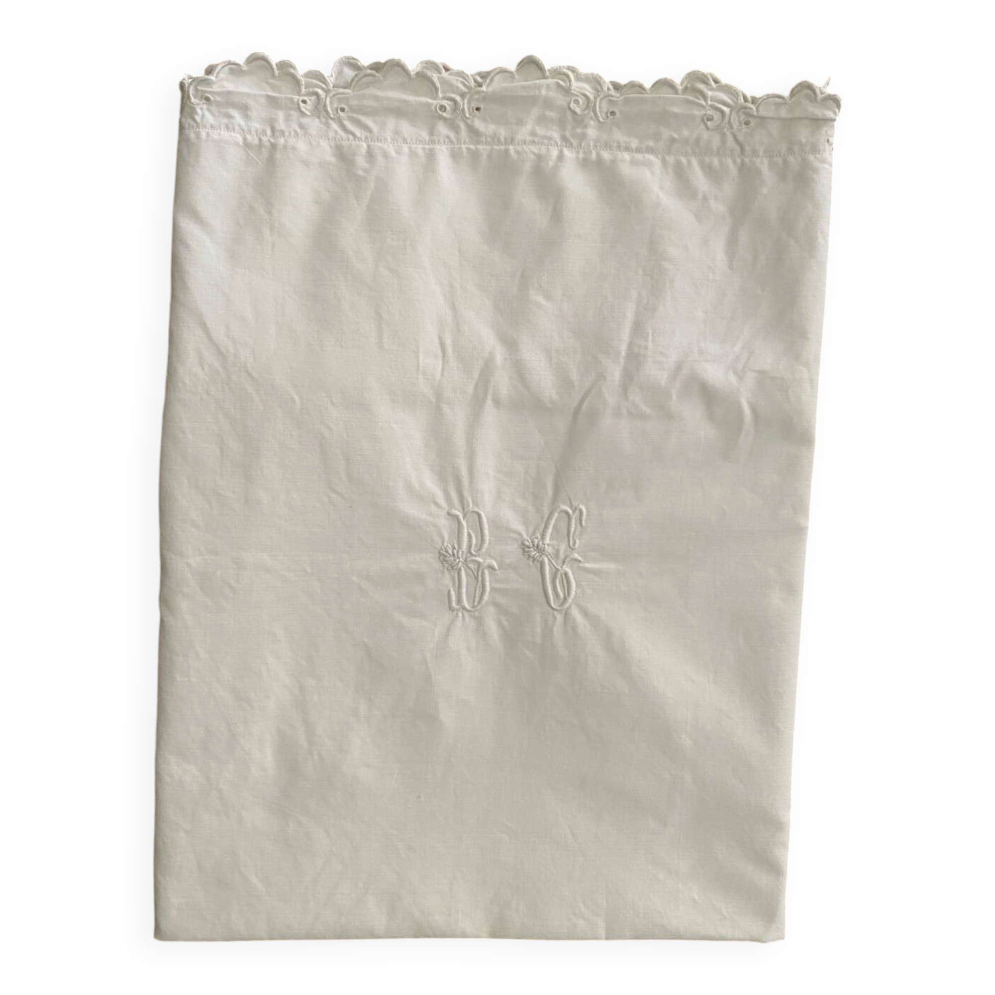 White cotton pillowcase with monogram BC.