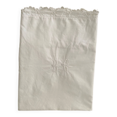 White cotton pillowcase with monogram BC.