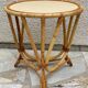 Round coffee table in vintage rattan