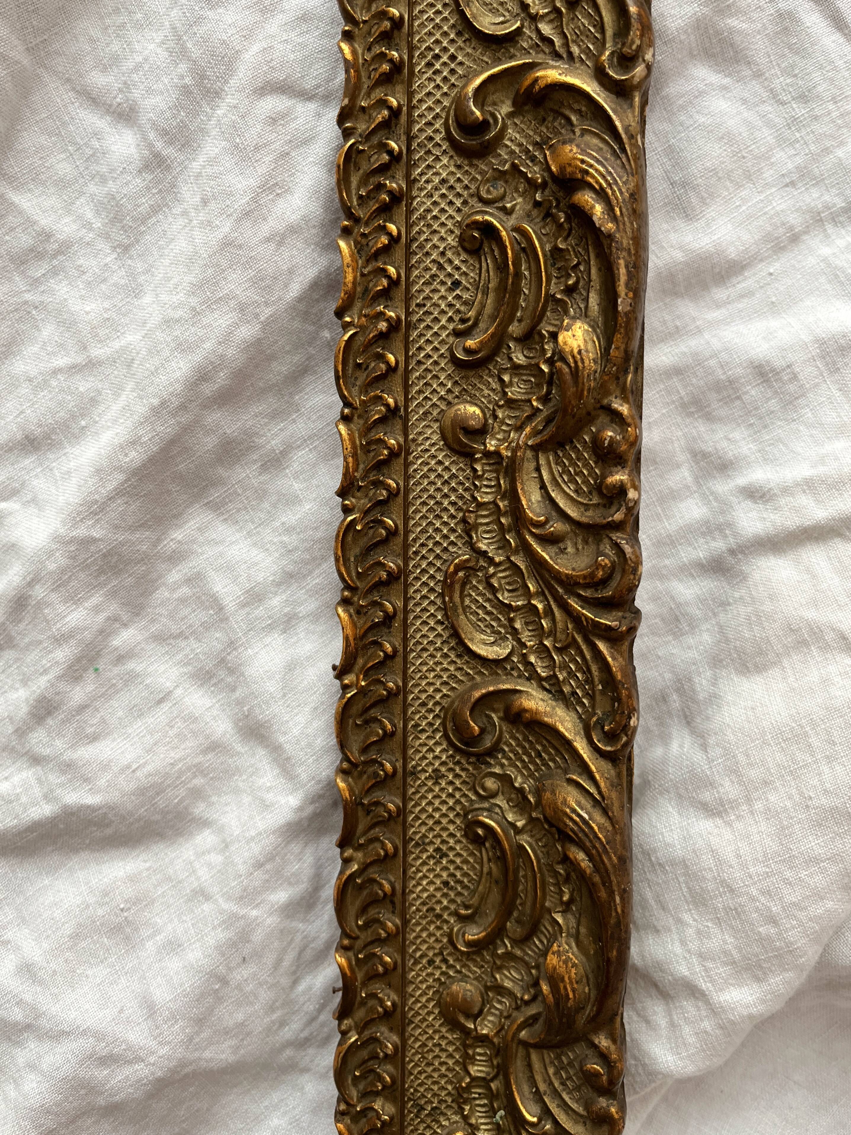 Old frame in gilded wood with stucco decoration circa 1900