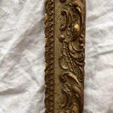 Old frame in gilded wood with stucco decoration circa 1900