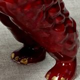 Burgundy and gold ceramic dog