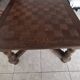 solid wood dining table the monastic with a checkerboard top