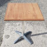 Foldable bistro table with teak top and aluminum base