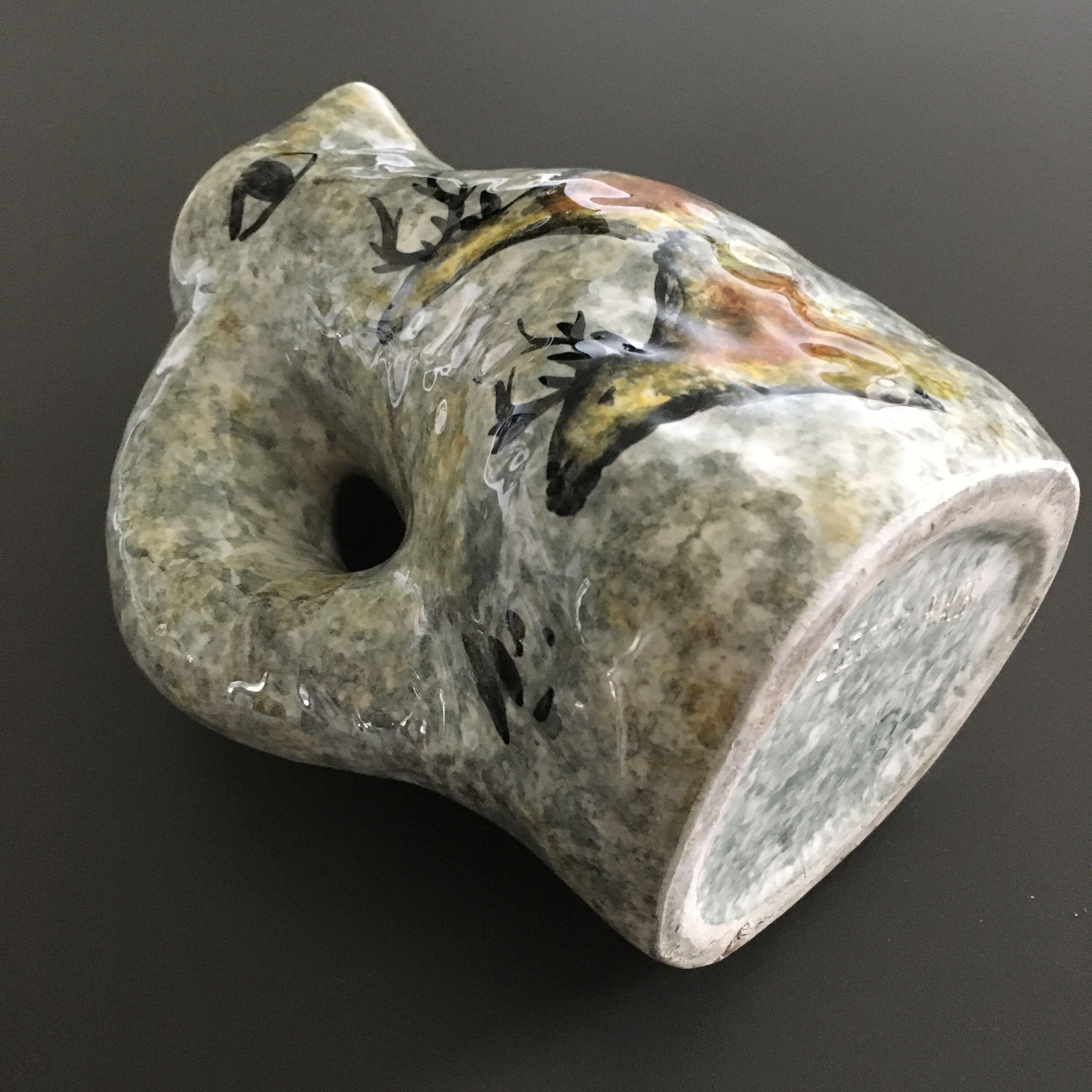 Zoomorphic pitcher with wall decoration