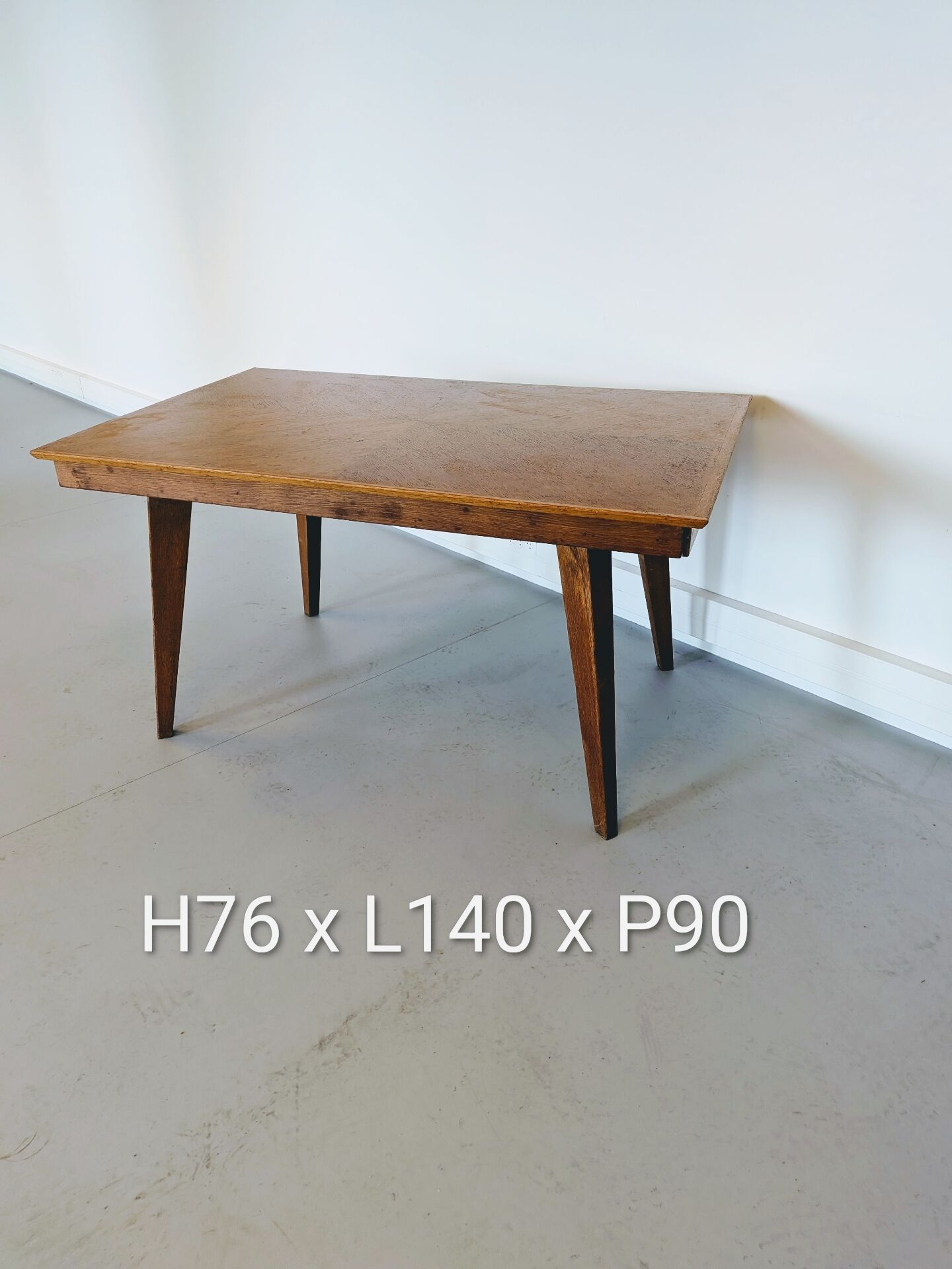 Vintage Scandinavian wooden dining table with tapered legs.