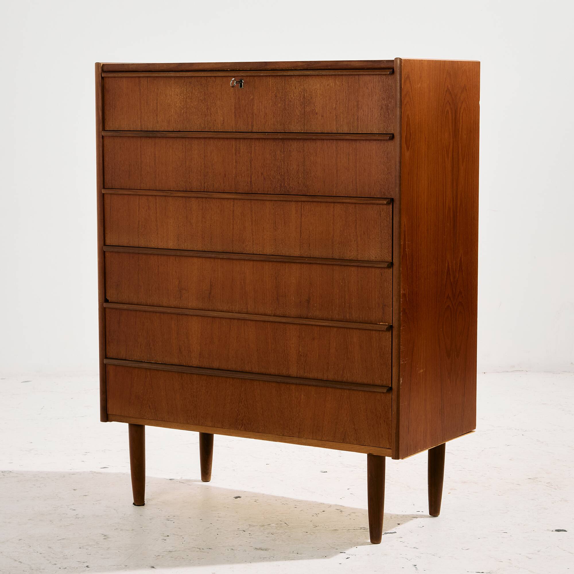 Teak dresser with six drawers