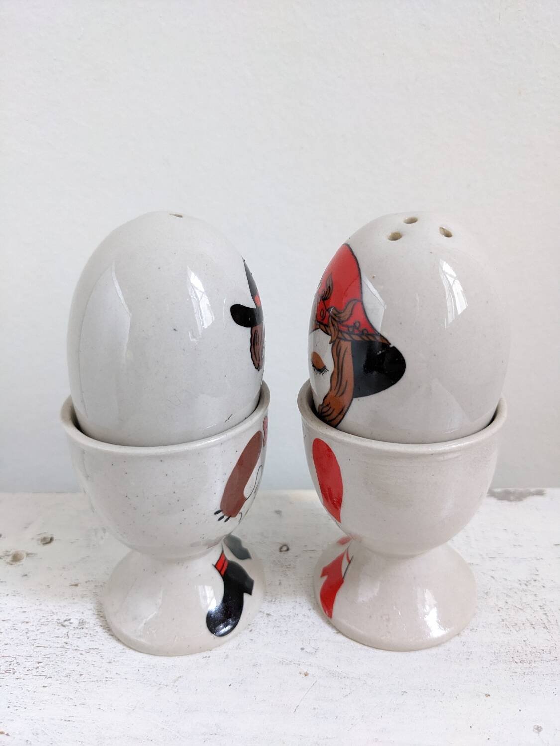 Egg cup, salt and pepper shaker duo