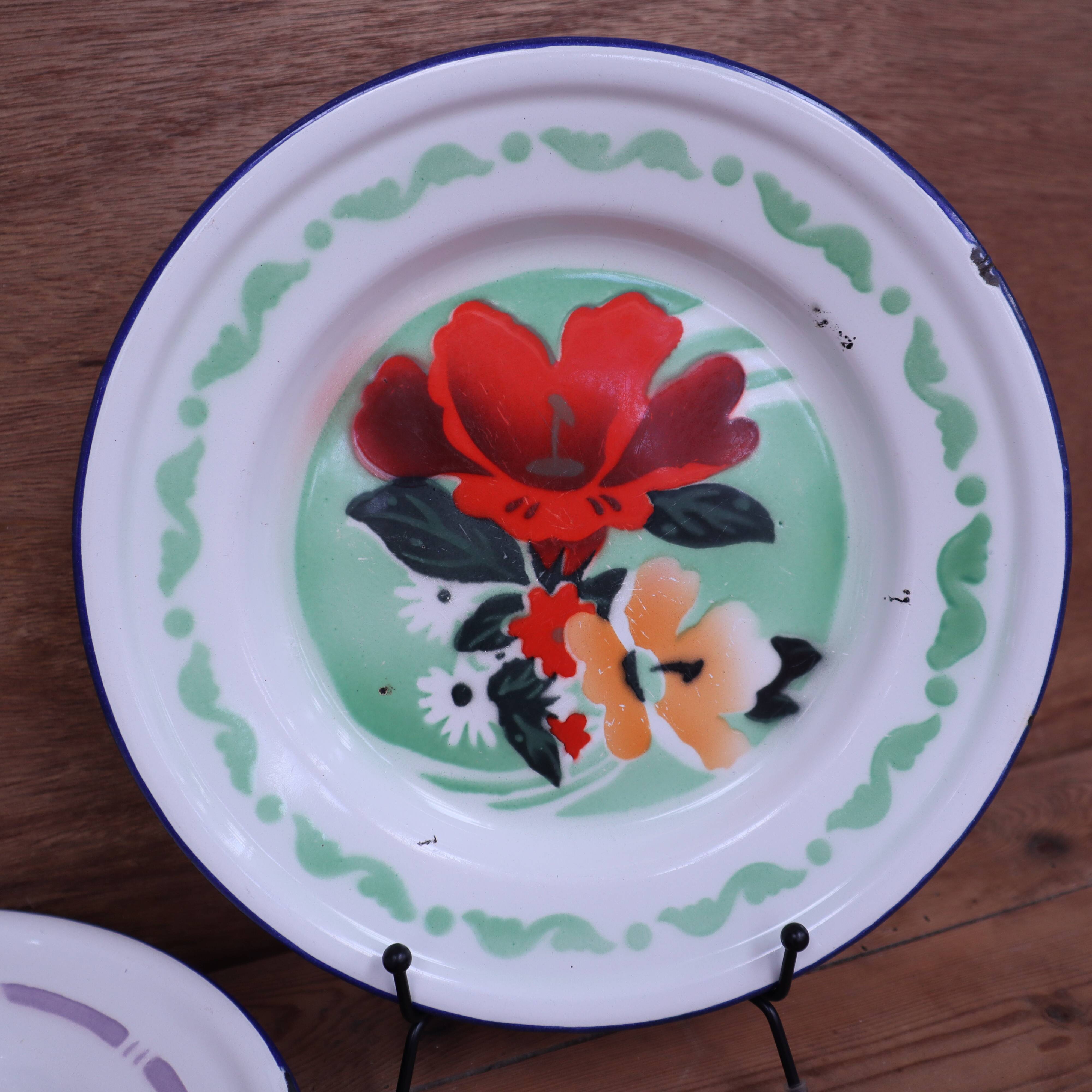 7 printed floral enamel plates "bon voyage" Made in China