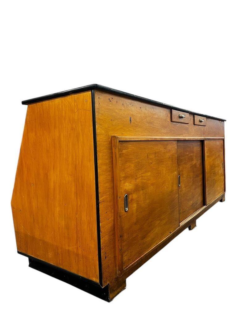 Vintage wooden shop counter with display case