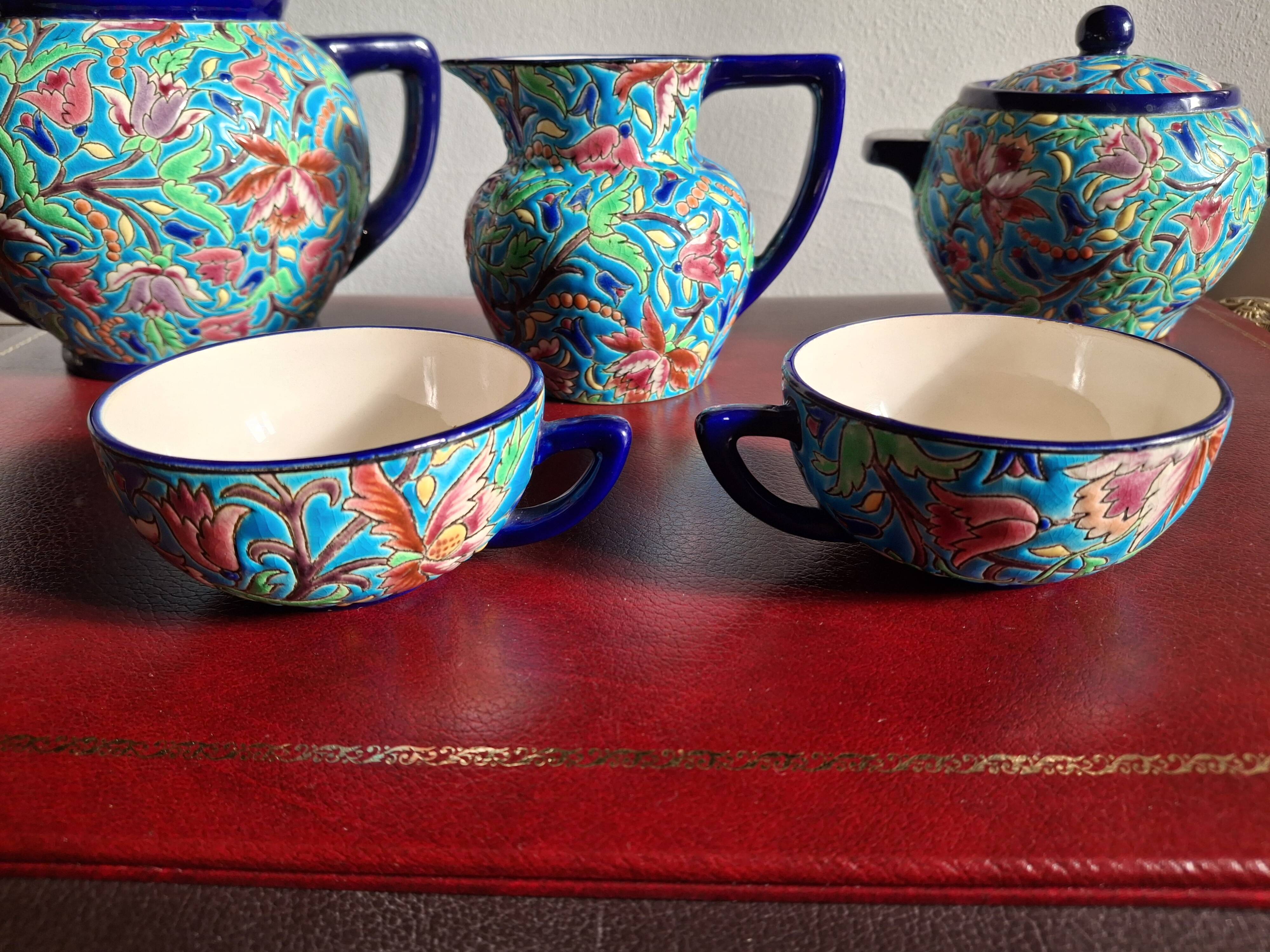 Cloisonné enamel tea service from Longwy in excellent condition.