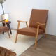 Fauteuil skaï et bois 50's
