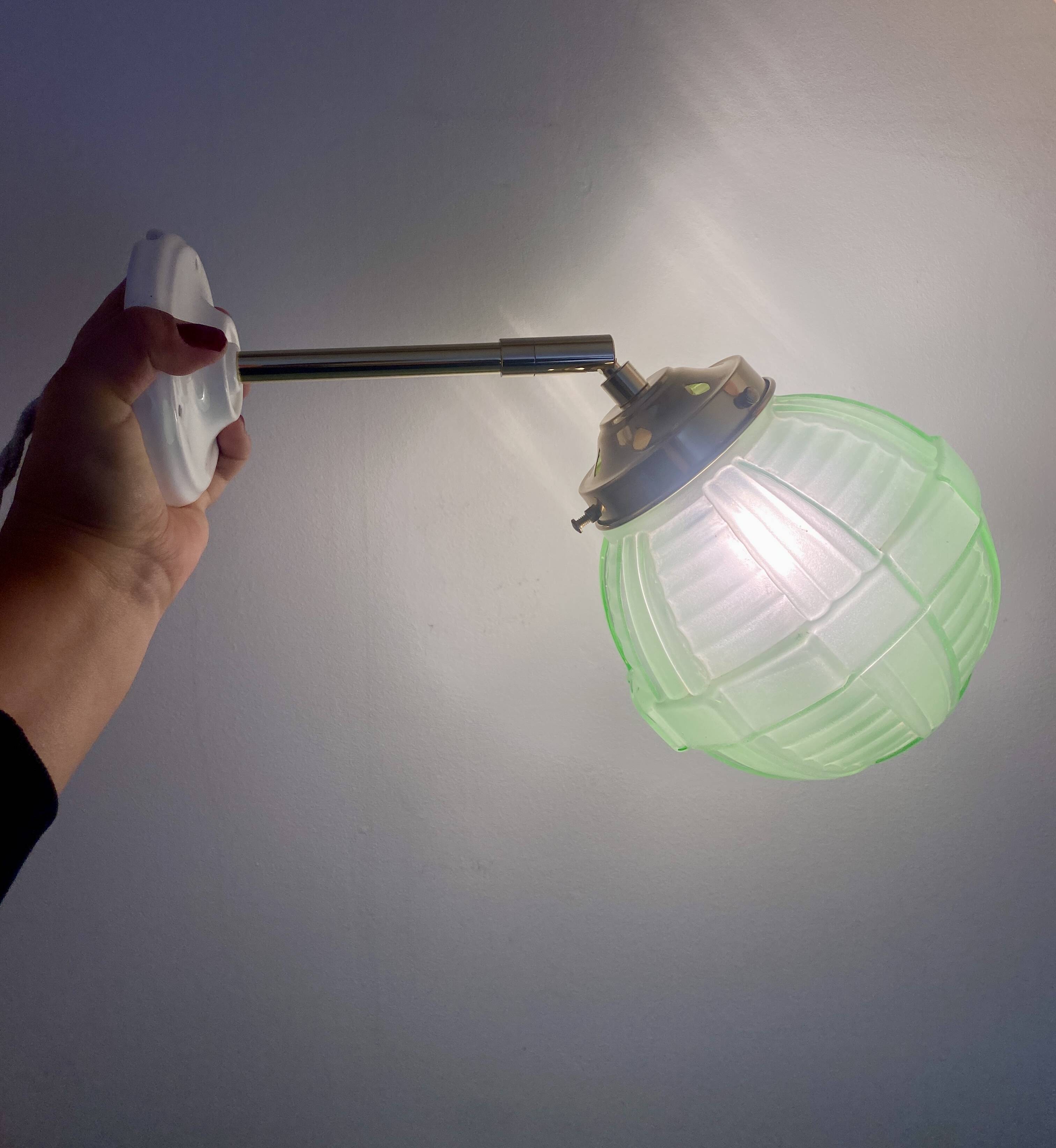 Vintage art deco globe wall light in green glass