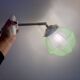 Vintage art deco globe wall light in green glass