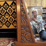 Art deco mirror in carved walnut