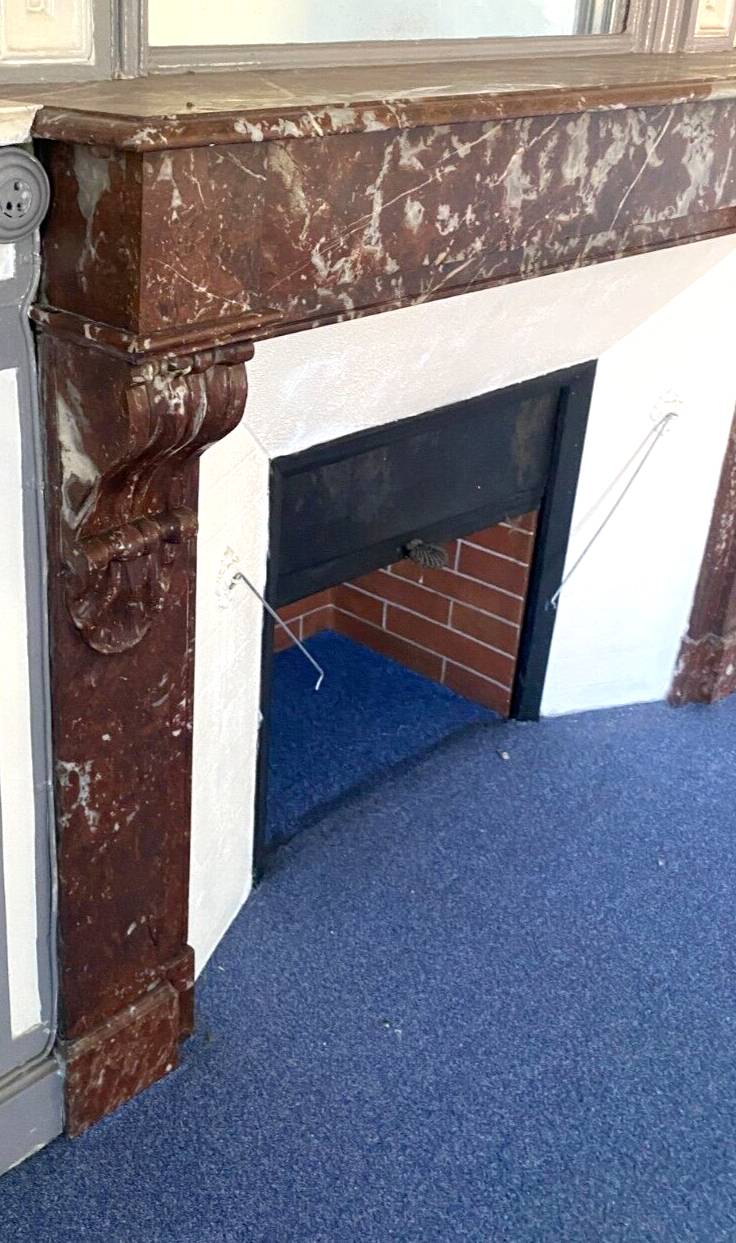 Louis Philippe style fireplace in speckled red marble 20th century