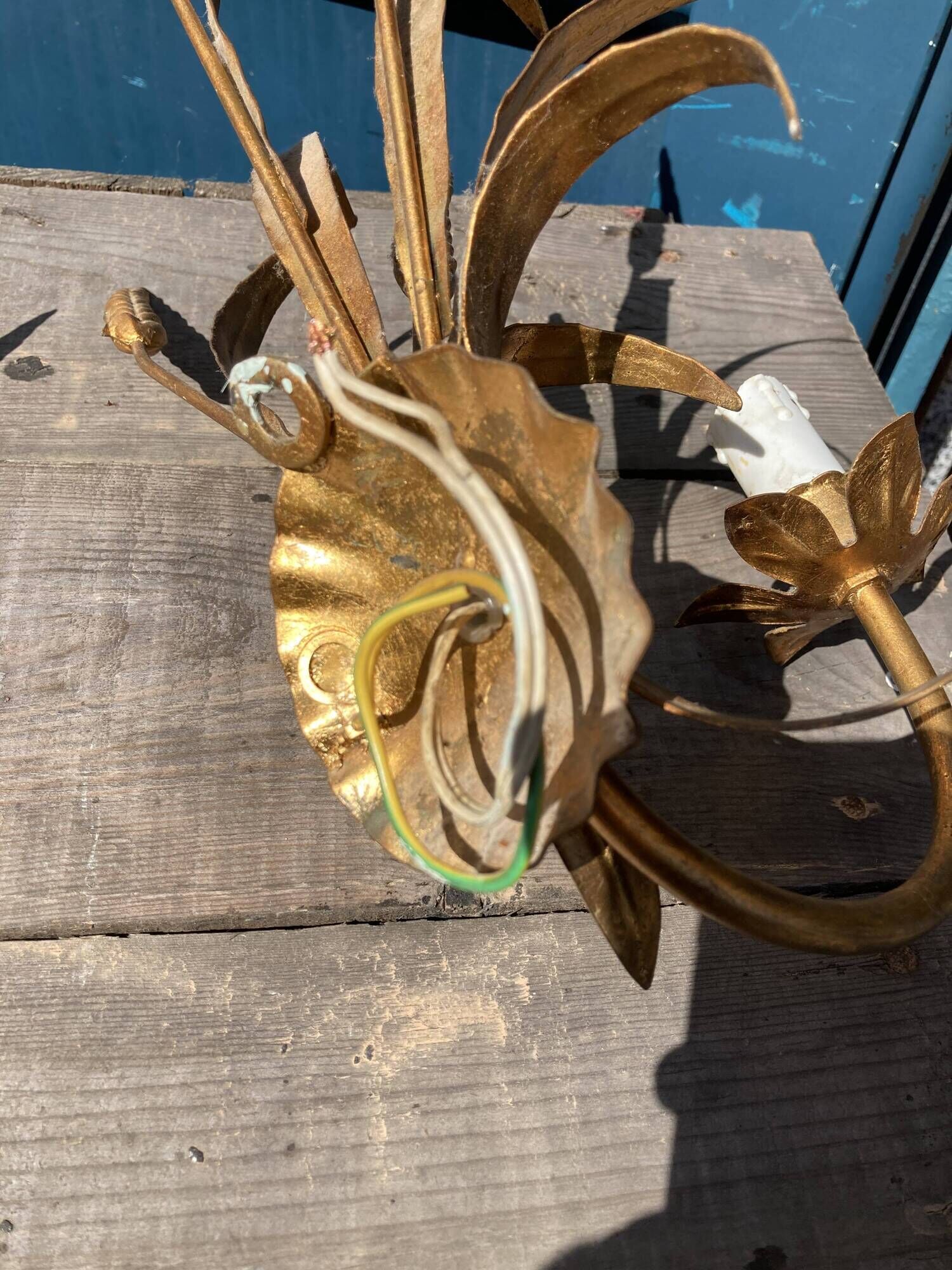 Pair of gold metal sconces decorated with wheat cob