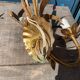 Pair of gold metal sconces decorated with wheat cob