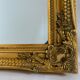 Miroir biseauté style empire doré 74x64cm
