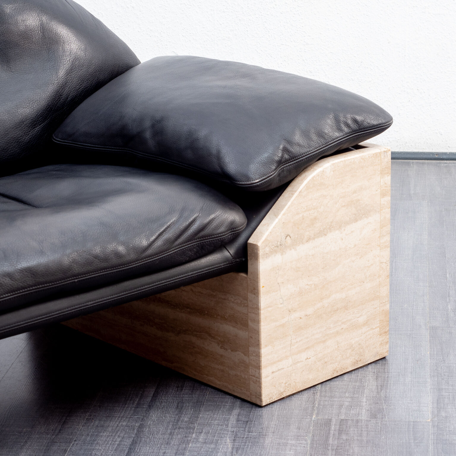 Vintage armchair, leather and travertine