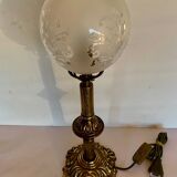 Ancient lamp on foot