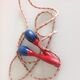 Old wooden jump rope red and blue / vintage