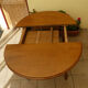 Solid wood round table with retractable extension