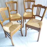 Series of 4 old mulched chairs