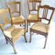 Series of 4 old mulched chairs