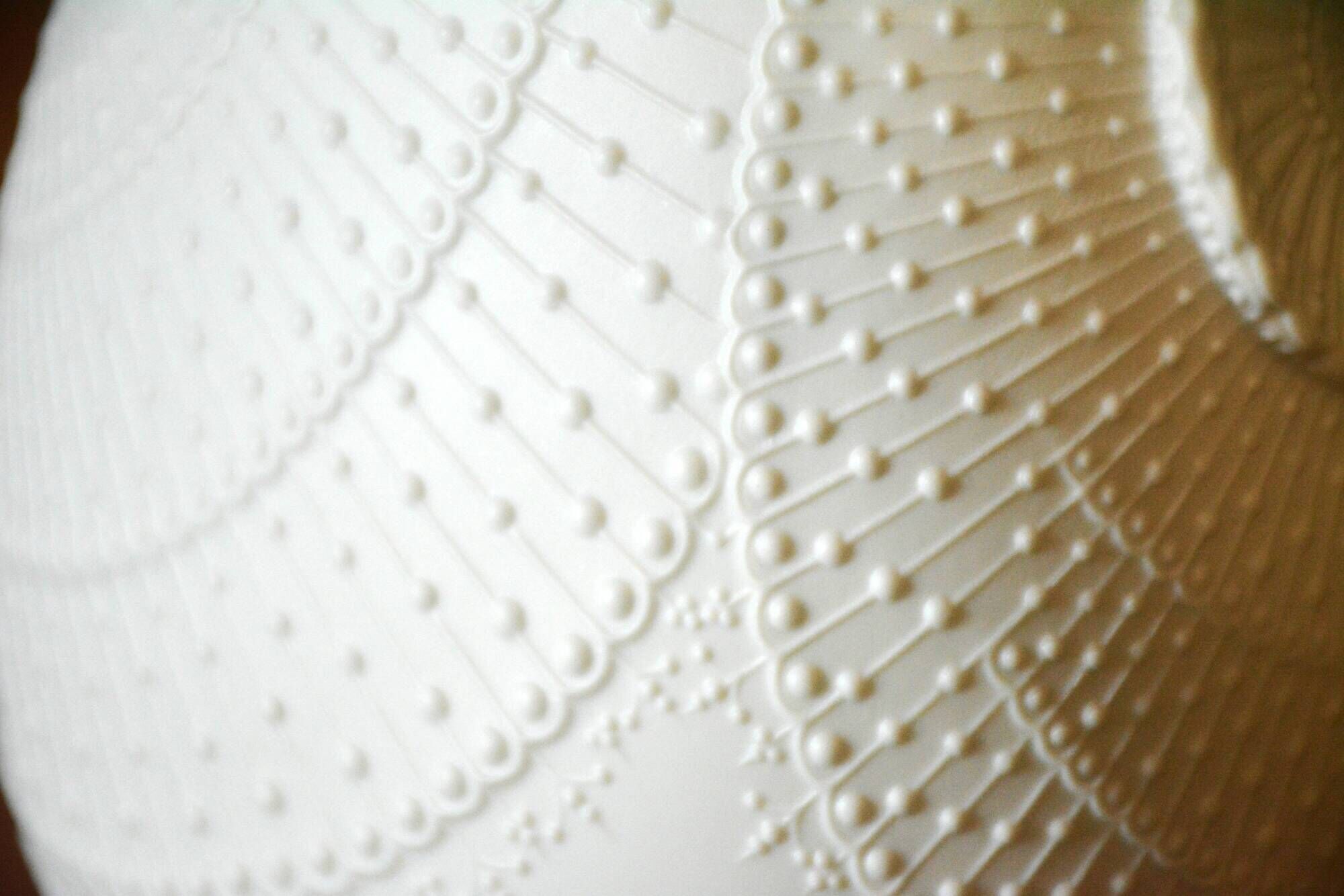 Biscuit porcelain vase by Kaiser, relief decoration, op art design.