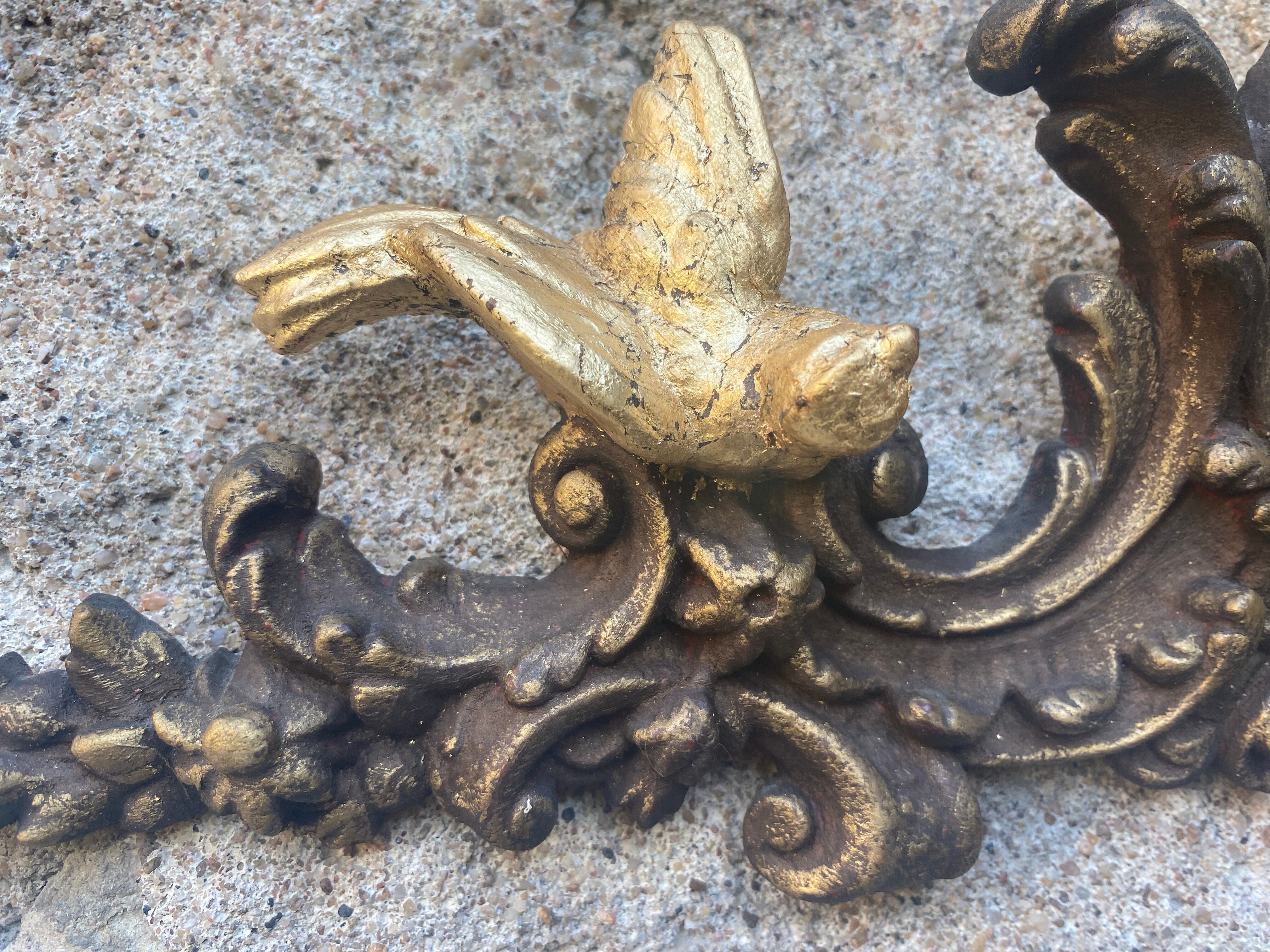 Pediment cherub musician