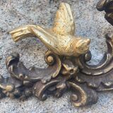 Pediment cherub musician