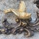 Pediment cherub musician