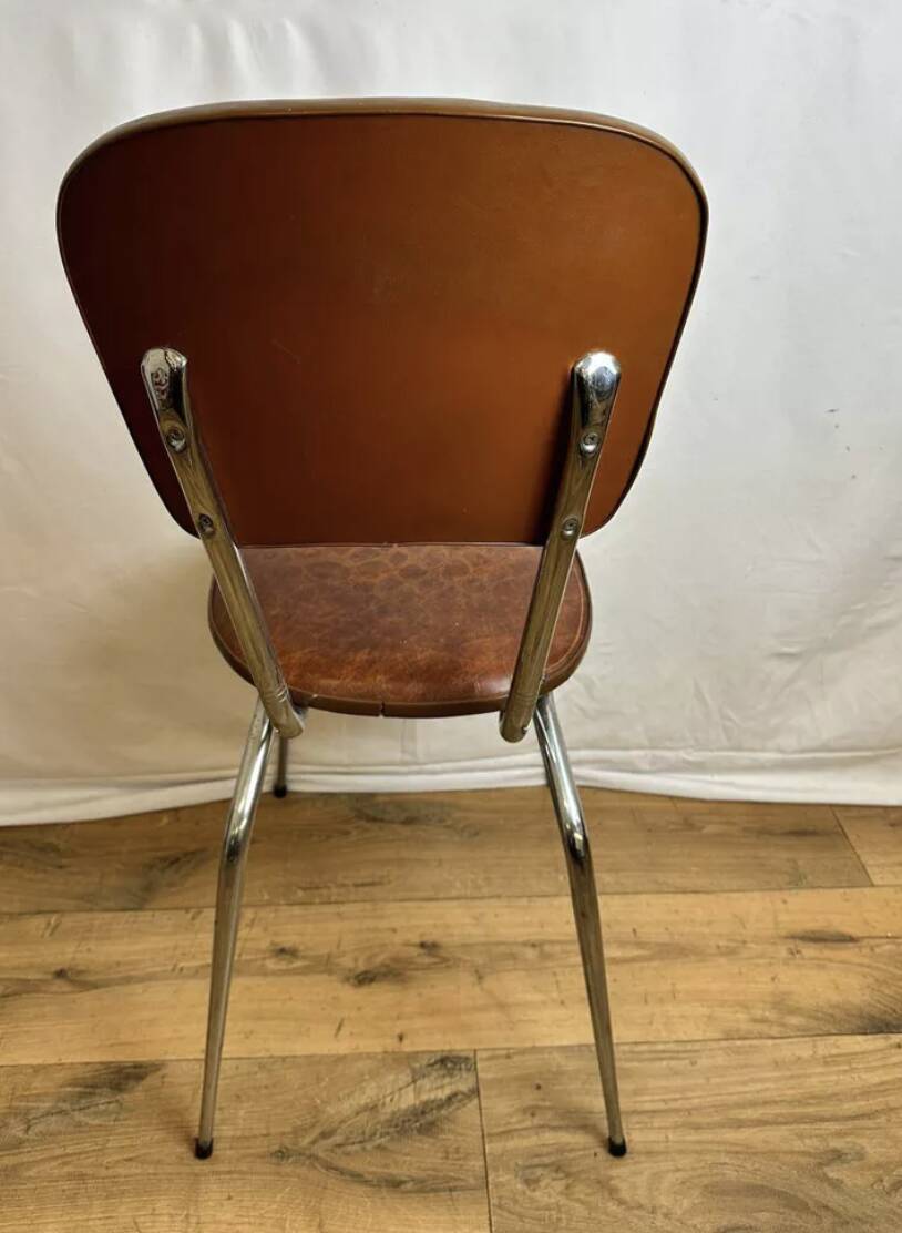 4 chairs in brown skai and chrome metal bases from the 60s