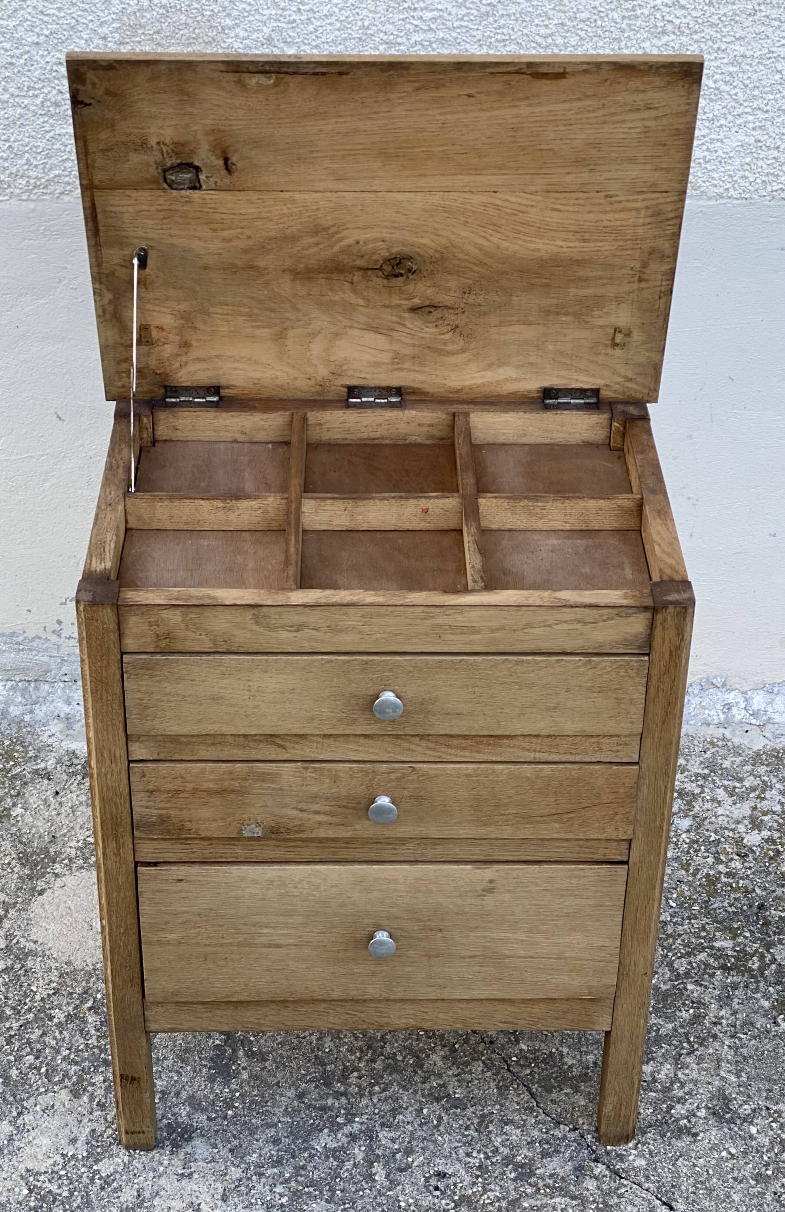 Small workshop cabinet with 3 stripped oak drawers.