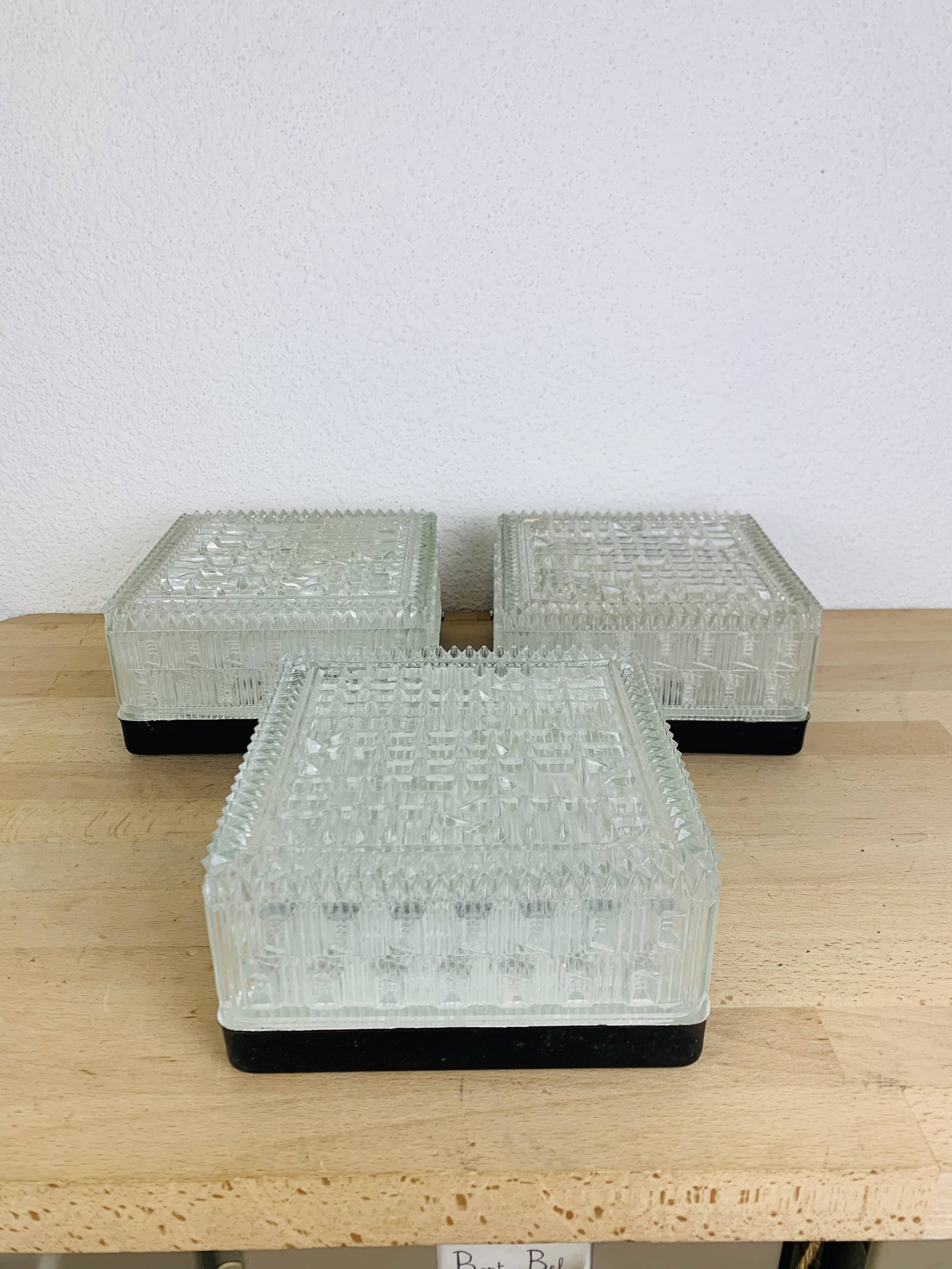 3 square wall lights in chiseled molded glass from the 50s, Holophane