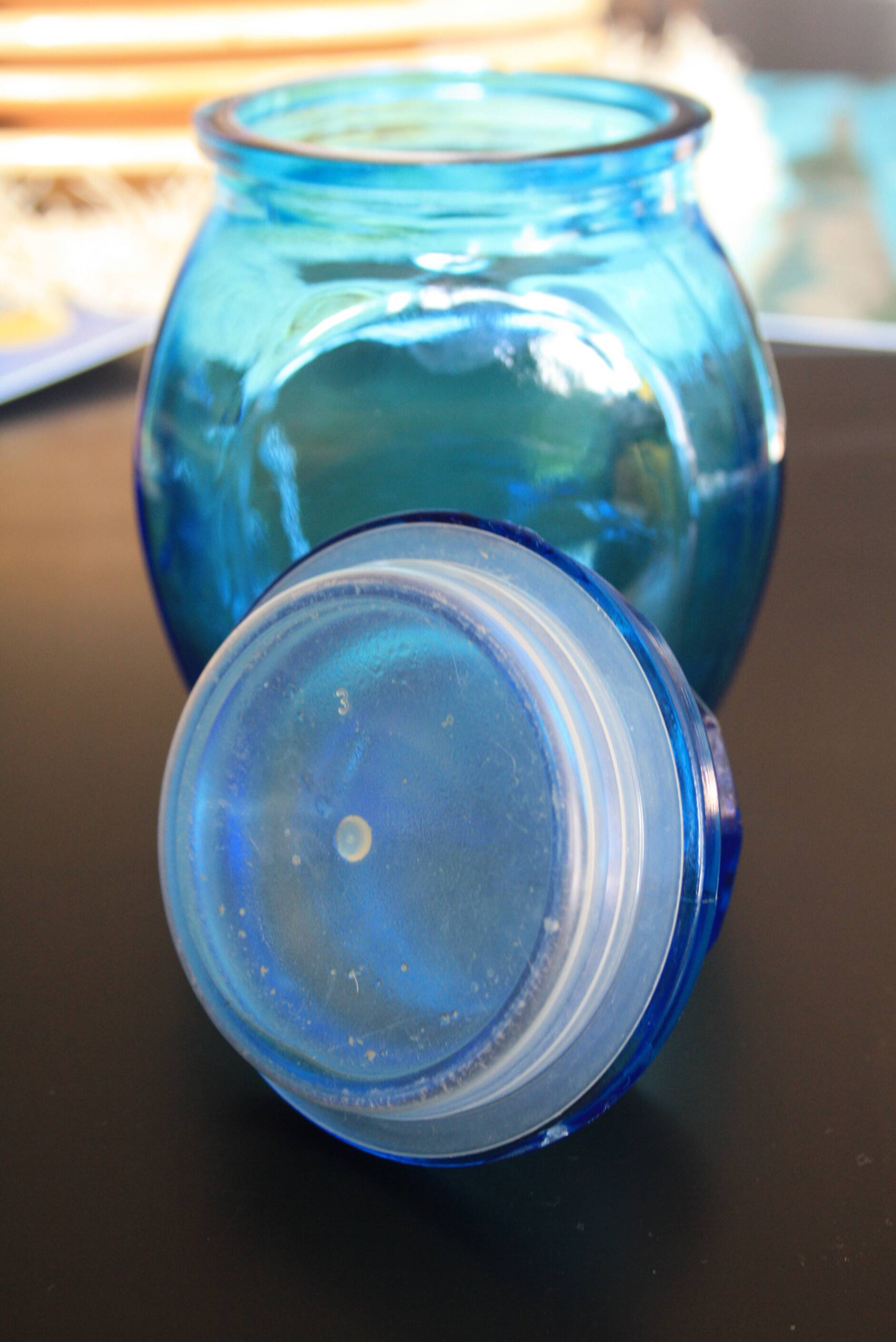 Blue glass jar with airtight lid