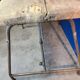 Vintage workbench circa 1930, folding metal leg.