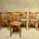 Series lot of 7 old bistro chairs in vintage curved wood