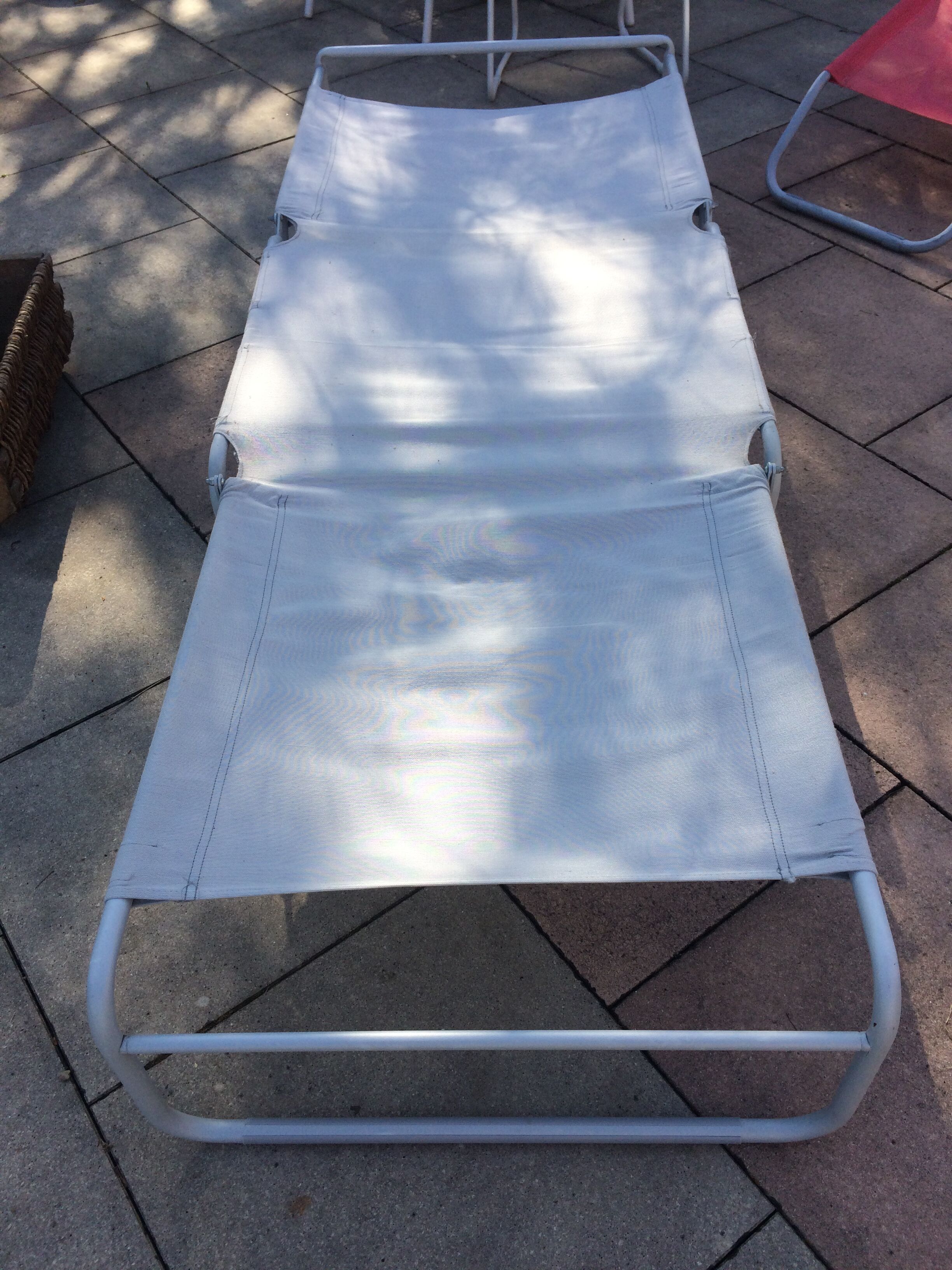 Chair - beige bed with cushions removable.
