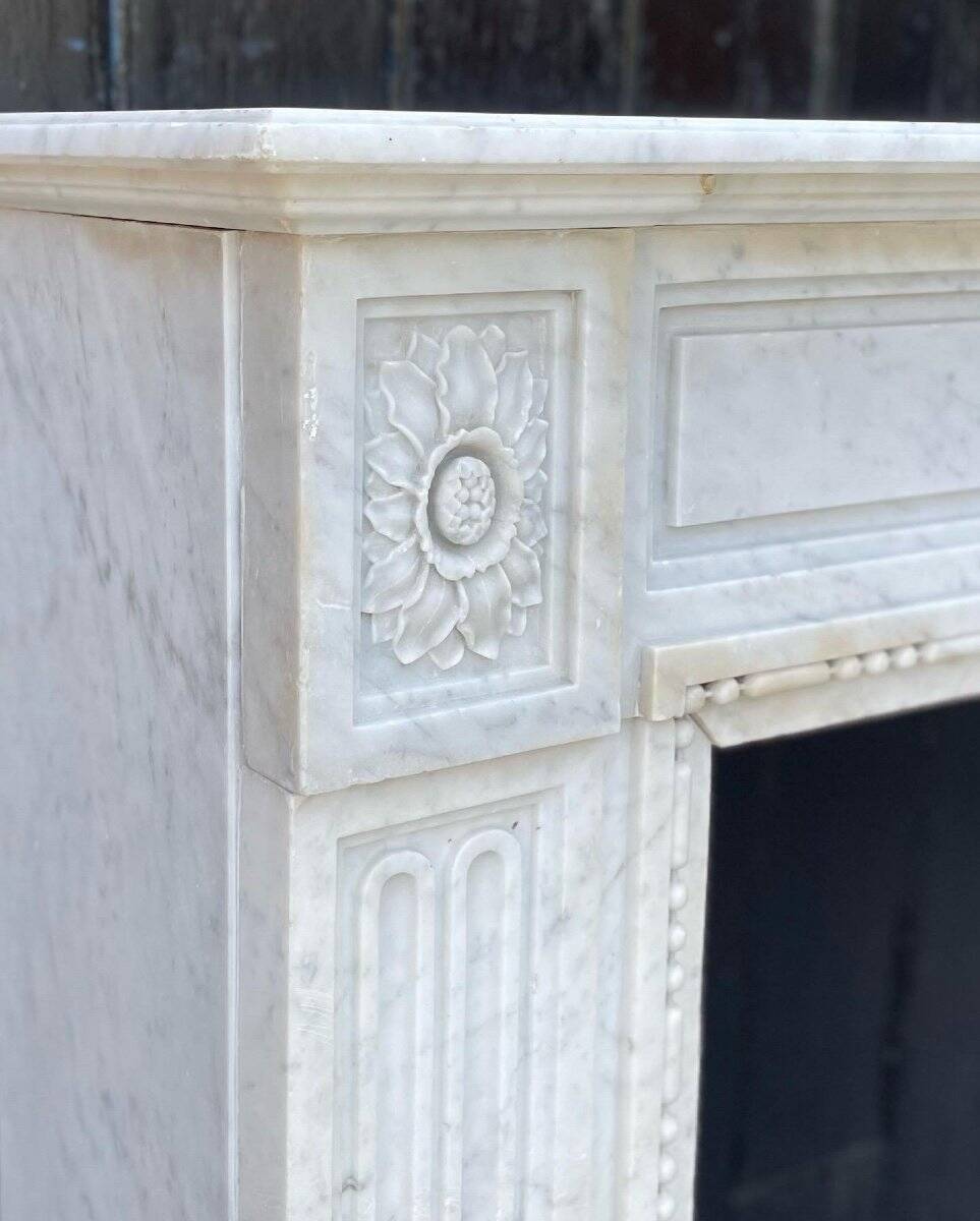 Louis XVI fireplace in Carrara marble