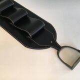 Leather wall-mounted magazine rack. Attributed to Jacques Adnet