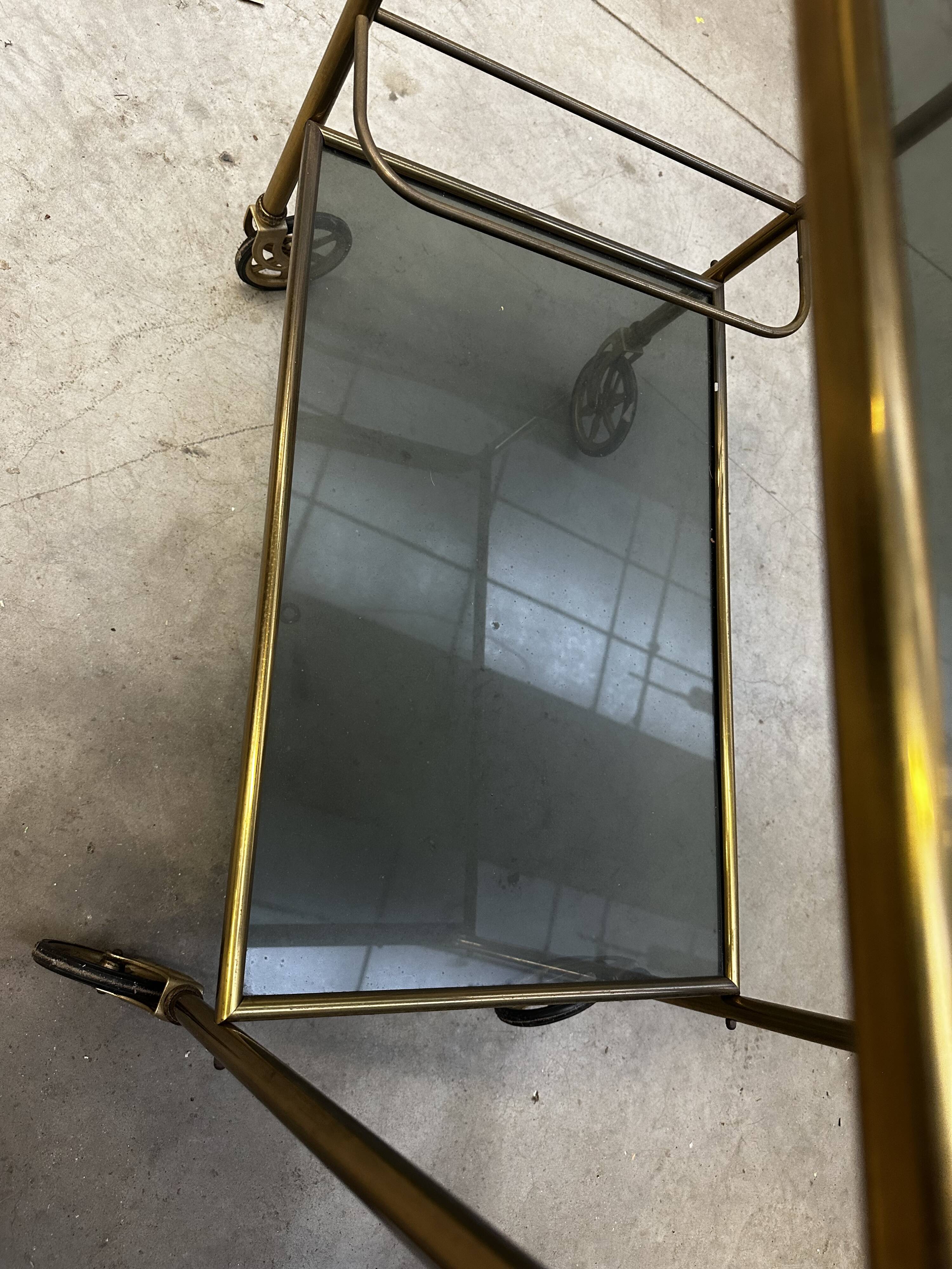 Vintage 70s serving trolley in gold metal and smoked glass