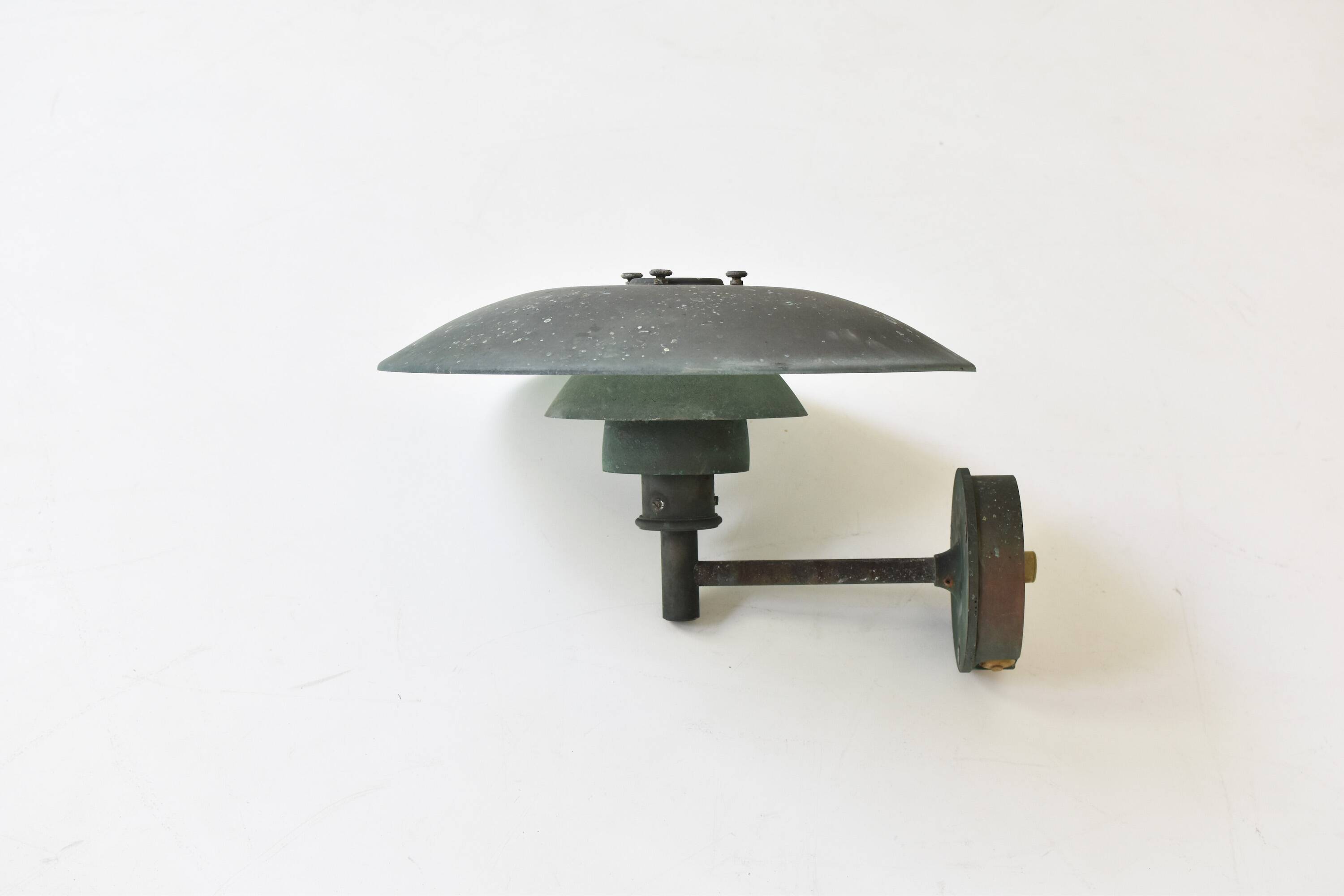 A set of two ph 4.5 copper wall lamps by poul henningsen for louis poulsen, denmark 1980s.