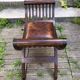 Fauteuil curule en bois et cuir